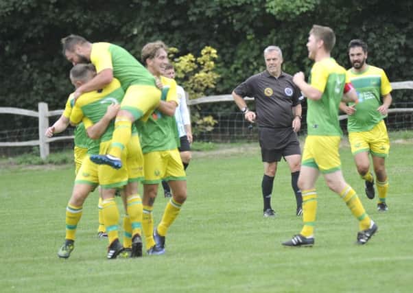 Westfield celebrate their first goal in the 2-1 win at home to Montpelier Villa. Pictures by Simon Newstead