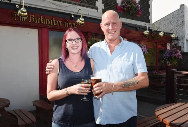 Buckingham Arms Refurbishment.

Pictured  is  Landlord Keith Robert-Jones with his wife Charlie Roberts- Jones. They are closing the pub on the 29th September for a complete refurbishment. 

Shoreham by Sea, West Sussex. 

Picture:Liz Pearce 21/08/2018

LP181243 SUS-180821-195723008