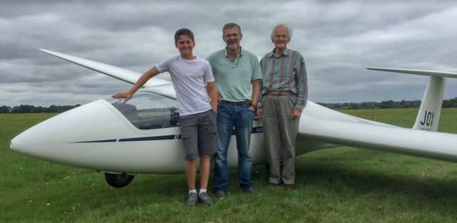 Three generations of flying Fressons - Christian with his dad Kevin and grandad Bill SUS-180822-103116001