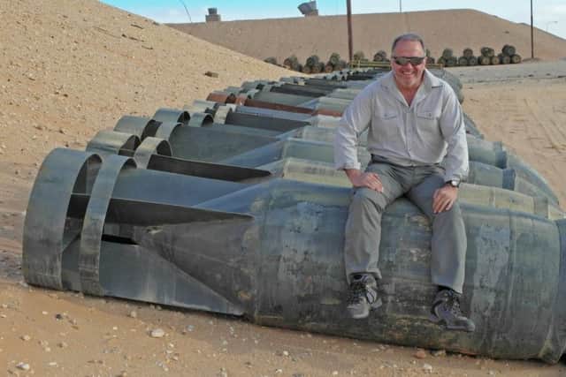 Dean Simpson, from East Broyle, with some of the bombs he dealt with in Libya.