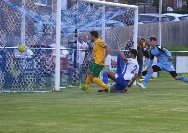George Landais fires in Horsham's second goal against Haywards Heath Town. Picture by John Lines