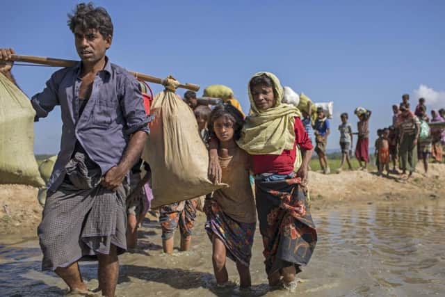 Rohingya refugees crossing into Bangladesh having spent several days in the no man's land between Bangladesh and Burma.  Picture by Jack Hill