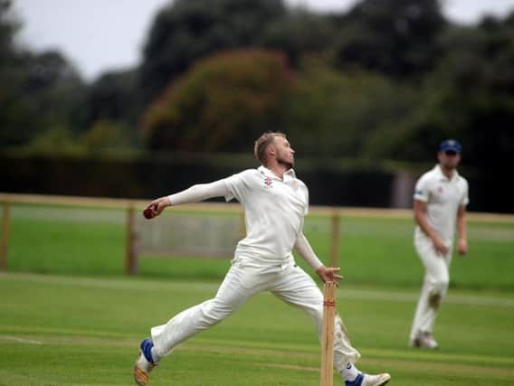 Magnus Kristensen bowling for Chichester against Three Bridges / Picture by Kate Shemilt