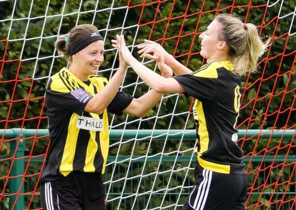 Two-goal Faye Rabson (left) and Sian Heather celebrate against Ipswich (Picture: Ben Davidson - www.bendavidsonphotography.com) SUS-180820-200554002