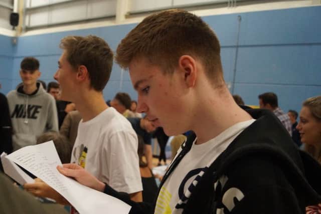 One pupil reading his results