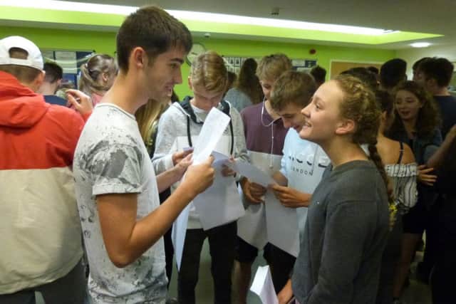 Students discuss their exam results