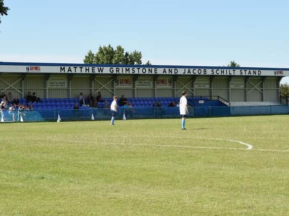 Matthew Grimstone and Jacob Schilt memorial stand at Worthing United's Lyons Way home