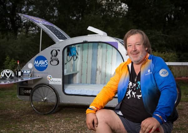 Pictured is Simon Aylett from East Guldeford, Rye, who is raising money by travelling to Syracuse, Sicily, using an Electric Cycle. Simon, will be staying in a custom desgined pod which uses solar power to recharge his bike. SUS-180830-130916001