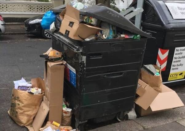Bins overflowing in Hove (Photograph: Maunie Catcheside) SUS-180820-181523001