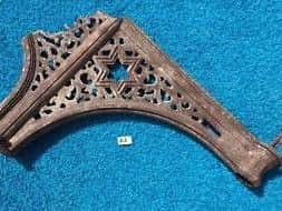 A cast iron weather screen bracket is up for auction