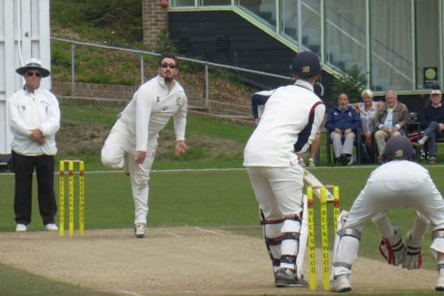Hastings Priory spinner Jack Coleman sends a delivery on its way at Horntye Park yesterday.