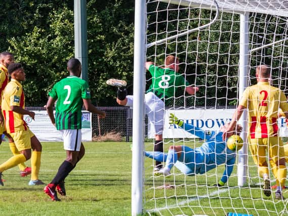 Pat Harding scores the Hillians consolation goal. Picture by Chris Neal