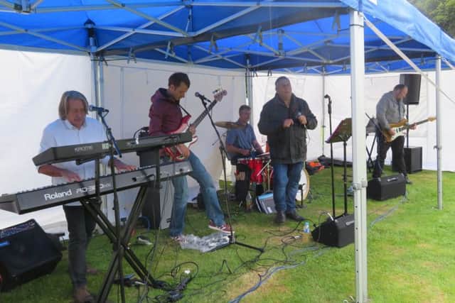 The Rockitmen at the Rotary club of Senlac's  'Music by the Lake' picnic 2018 SUS-180828-121658001