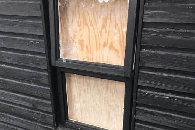 Broken window at the back of the shop