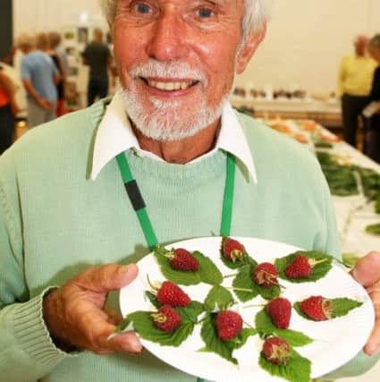Jake Powis won first prize for his raspberries. Picture: Derek Martin DM1890583a