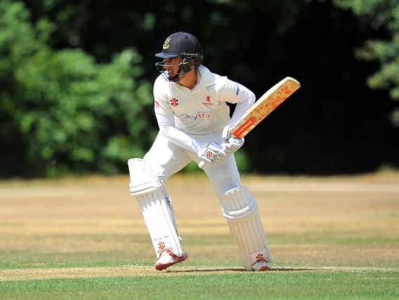 Tom Haines hit 106 with the bate for Horsham as well as picking up two wickets. Picture by Steve Robards.