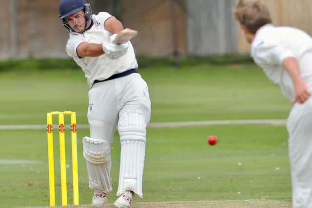 McLeod Cox crashed an unbeaten century as Littlehampton were crowned champions. Picture by Stephen Goodger
