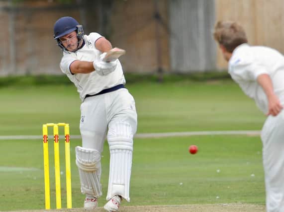 McLeod Cox crashed an unbeaten century as Littlehampton were crowned champions. Picture by Stephen Goodger