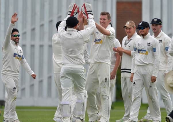 Roffey celebrate a wicket at Eastbourne on Saturday in their Sussex League Premier Division title decider. JON6495. Picture by Jon Rigby