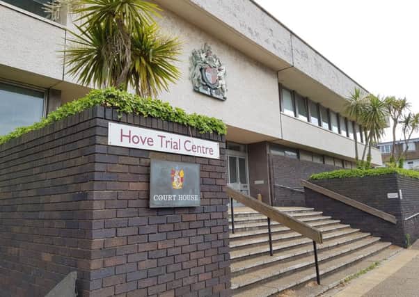 The trial is taking place at Hove Crown Court