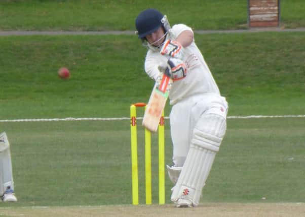 Will Smith unleashes a drive during Bexhill Cricket Club's defeat at home to Haywards Heath. Pictures by Simon Newstead
