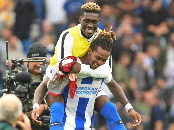 Yves Bissouma and Gaetan Bong celebrate after Albion beat Manchester United earlier this month. Picture by PW Sporting Photography