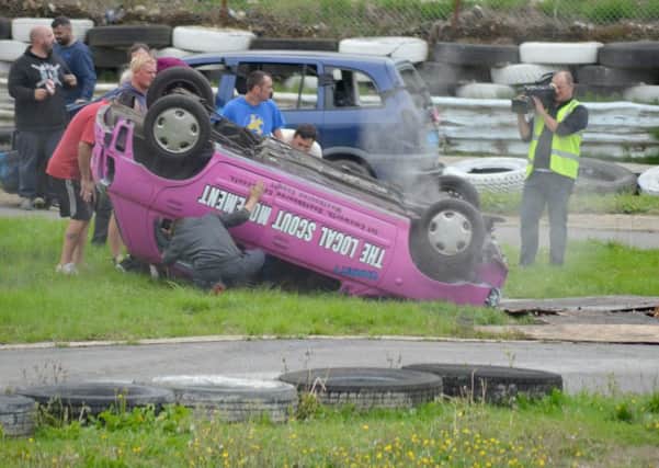 Spectacular crash for the woman in Emsworth who tackled the car jump stunt in Angmering over the bank holiday.   Picture: www.shuttersphotography.co.uk