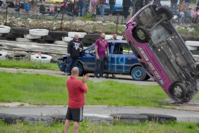 Spectacular crash for the woman in Emsworth who tackled the car jump stunt in Angmering over the bank holiday.   Picture: www.shuttersphotography.co.uk SUS-180830-152523001
