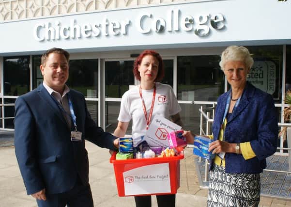 Andrew Green, Lynsey Hutcheson and Shelagh Legrave pictured with the first Red Box at Chichester College