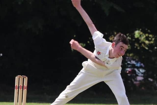 Dom Morgan bowling for Lindfield