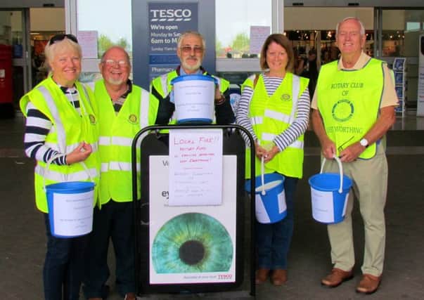 West Worthing Rotarians collecting for the victims of the Rectory Road fire at Tesco in Durrington