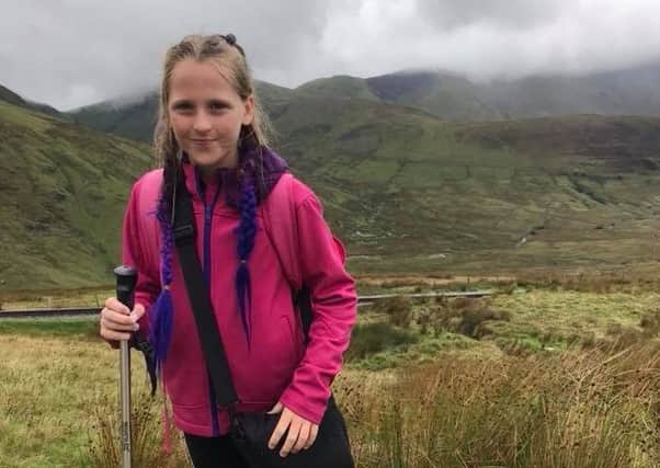 Olivia Bennett age 10, climbed Mount Snowden SUS-180509-104801001