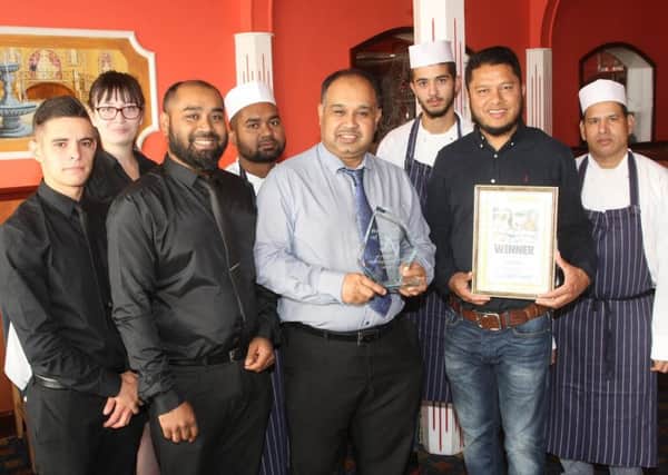 Askor Ali and his team at Mahaan, the Herald and Gazette Restaurant of the Year 2018. Photo by Derek Martin DM1891219a