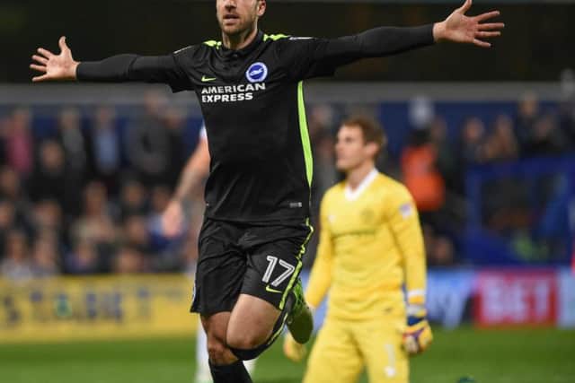 Glenn Murray celebrates scoring against QPR in Albion's promotion-winning season. Picture by PW Sporting Photography