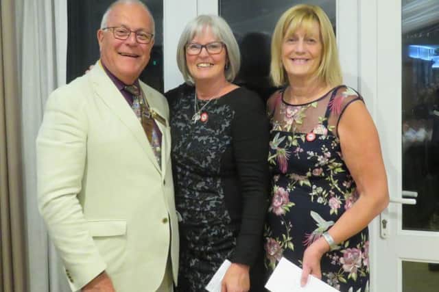 Dave Miles, Angela Hastings and Susan Pellett of the Brain Tumour Trust SUS-180409-130907001