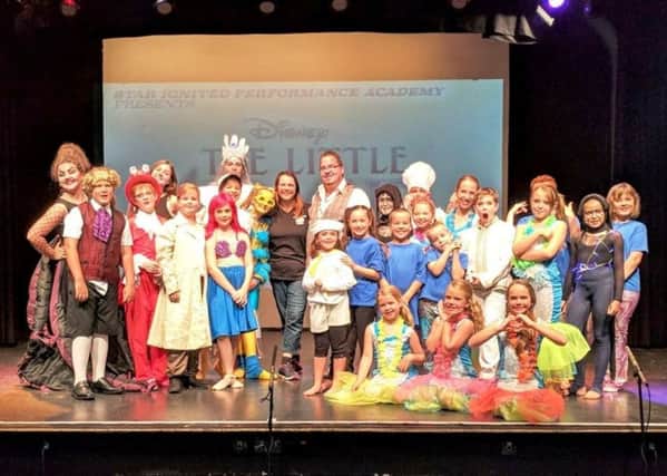 Billy with the cast and crew of Star Ignited Performance Academys The Little Mermaid Jr. at the Windmill Theatre in Littlehampton