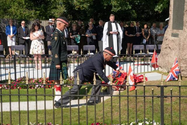Chief Warrant Officer Kent Griffiths, CD and Lieutenant Colonel (retired) Lee Villiger, CD laying a wreath. Picture by David Ash Peake
