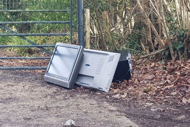 Large domestic appliances have been among the items dumped in Three Oaks. Picture: Ross Lewis
