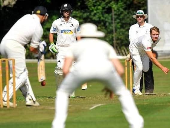 Horsham's overseas player Mika Ekstrom bowls to his Roffey counterpart Ben Maneti. Picture by Steve Robards.
