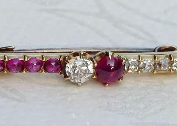 Part of the 19th century ruby and diamond brooch