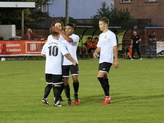 Pagham celebrate one of their six goals against East Preston / Picture by Roger Smith