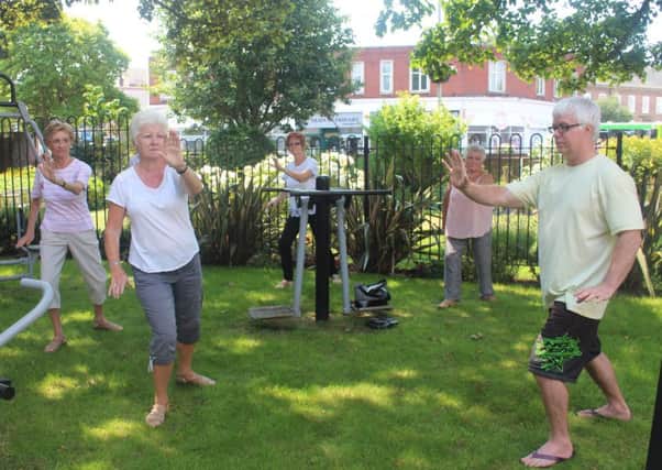 Tai chi in the garden at the Guild Care Centre in Worthing