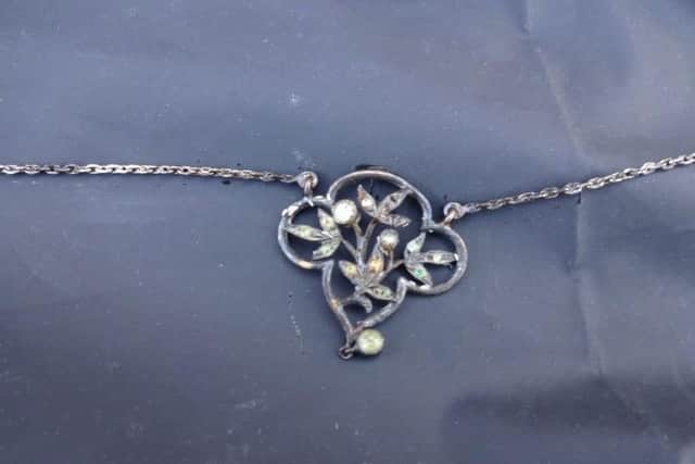A distinctive necklace she was found wearing