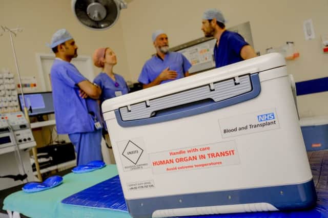 Organ donation box arriving at hospital for transplant operation. SUS-180607-112842001