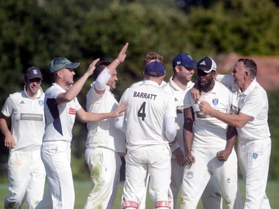 Pagham celebrate a wicket at Stirlands, where they won on the final day / Picture by Kate Shemilt