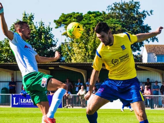 Jimmy Muitt vies for possession in the Rocks' win over Kingstonian / Picture by Tommy McMillan