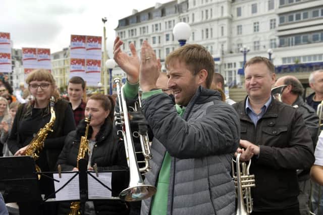 Musicians at Eastbourne Bandstand protesting about the cuts to East Sussex Music Service (Photo by Jon Rigby)