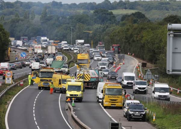 A four-vehicle crash has caused huge delays on the M23