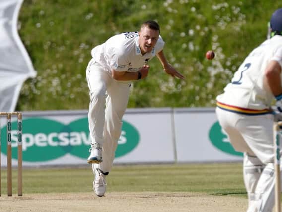 Ollie Robinson took 10 for 67 in the match - a career-best effort / Picture by Neil Marshall