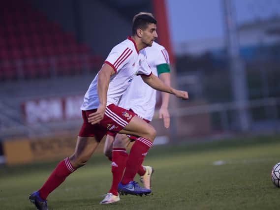 Omar Bugiel in action for Worthing. Picture by Marcus Hoare